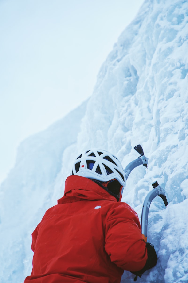 Ice climbing on glacial wall